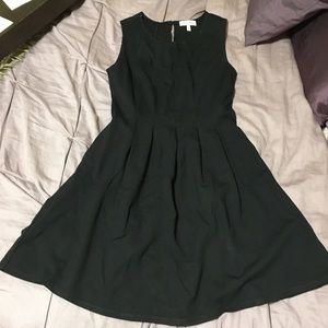 Short pleated black mini dress